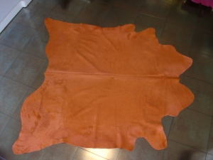 Orange cow hide carpet